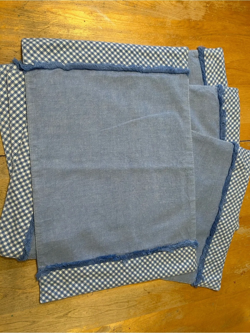 Chambray Placemats (4) 12”x18”, Light Blue with Blue Fringe & Checked Border Exc